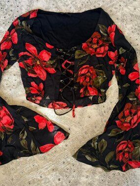 boho floral lace up corset style front bell sleeve long sleeve cropped top.